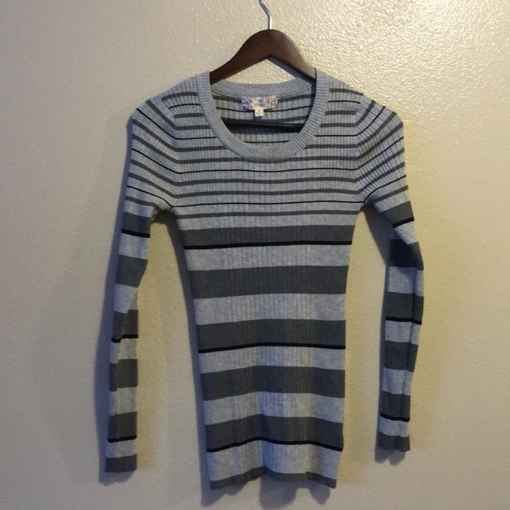 Women’s medium striped sweater.